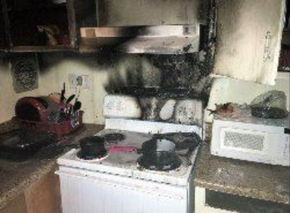 Image of a kitchen stove that has burned